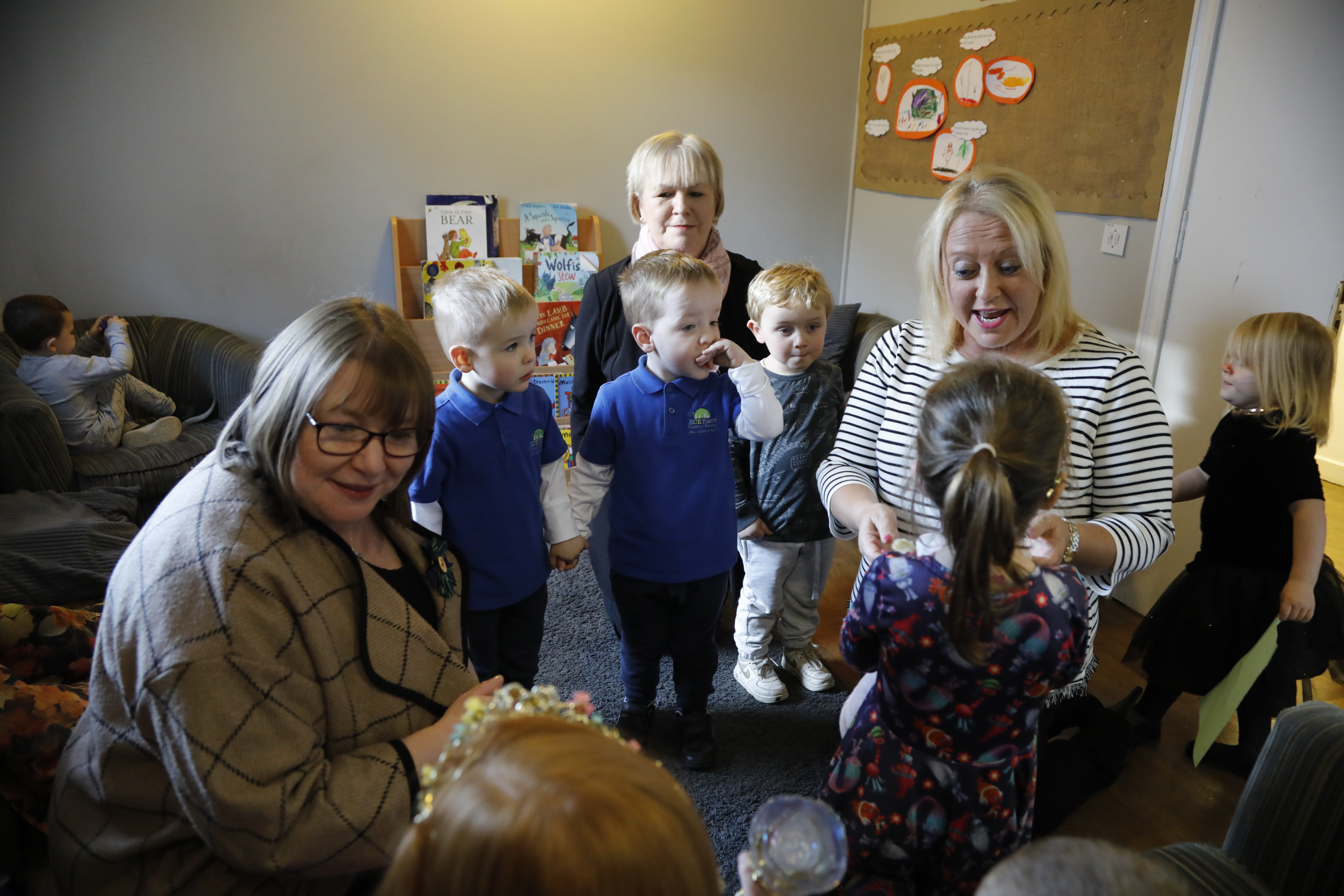 Picture shows Committee Members visiting a nursery in Rutherglen and talking to young children, as part of the Committee's work on the expansion of early learning and childcare.